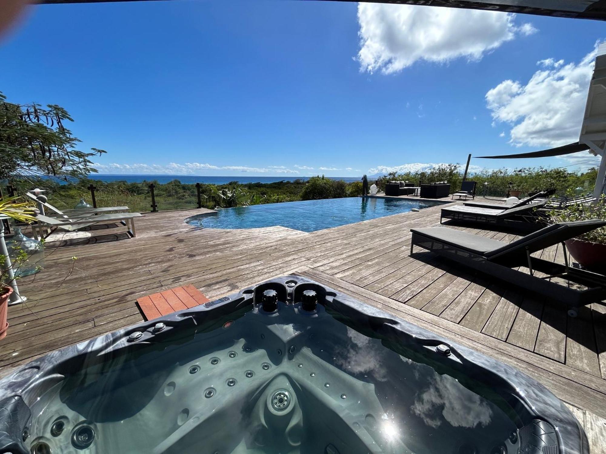 Villa Deluxe L'Hacienda Villa Vue Mer 180 Piscine Jacuzzi Proche Plage Marina Golf Pointe Des Chateaux Et Casino Jardin Clos Voyage Durable Сен-Франсуа Экстерьер фото